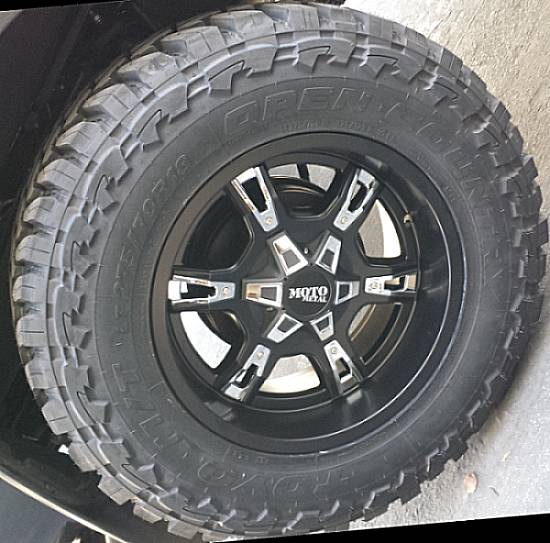 MO969 Black Wheels on Toyo Open Country M/T Tires